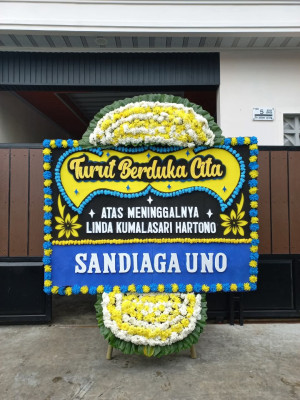 Papan Bunga Duka di Monano